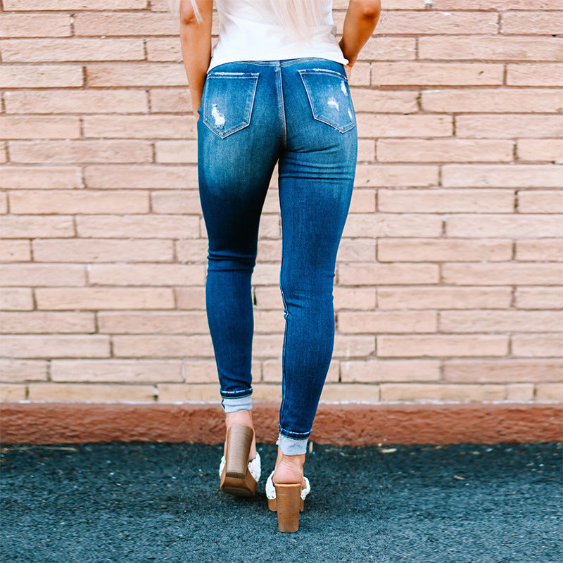 Distressed High-Waist Skinny Jeans